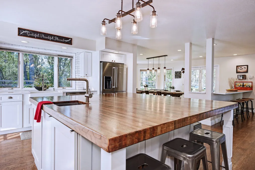 New kitchen remodel with white cabinetry and island